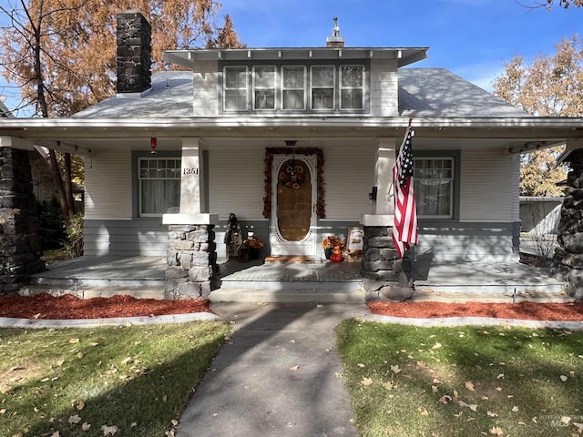 1351 Poplar, Twin Falls, ID 83301 - bungalow-style house featuring a porch and a chimney