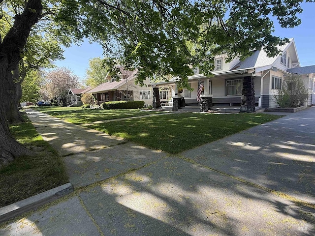 1351 Poplar, Twin Falls, ID 83301 - view of front facade with a front lawn and a porch