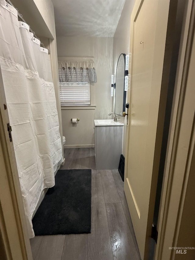 1351 Poplar, Twin Falls, ID 83301 - full bathroom with vanity and hardwood / wood-style floors