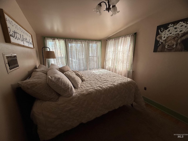 1351 Poplar, Twin Falls, ID 83301 - bedroom featuring vaulted ceiling and baseboards