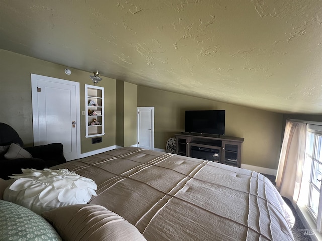 1351 Poplar, Twin Falls, ID 83301 - bedroom with vaulted ceiling and a textured ceiling