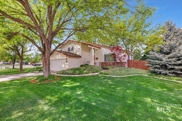 1037 Pahsimeroi Dr, Twin Falls, ID 83301 - view of front of house with a garage, concrete driveway, and brick siding