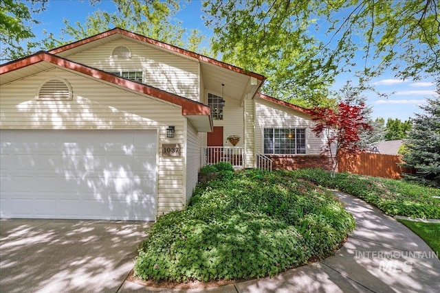 1037 Pahsimeroi Dr, Twin Falls, ID 83301 - view of front of house with concrete driveway and an attached garage