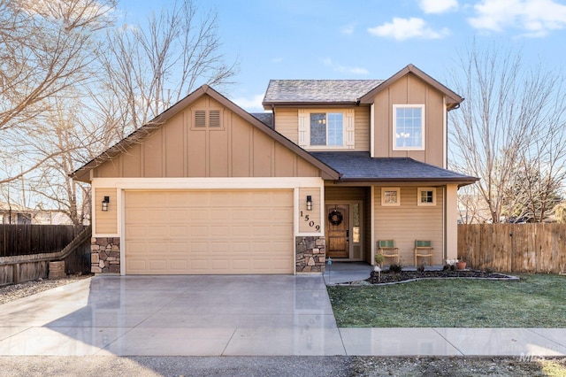 craftsman-style house with a garage and a front yard