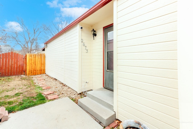 entrance to property featuring a patio area