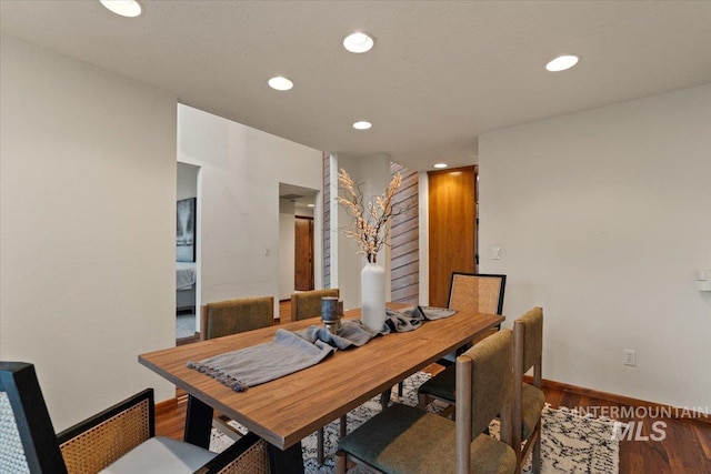 dining area with recessed lighting, wood finished floors, and baseboards