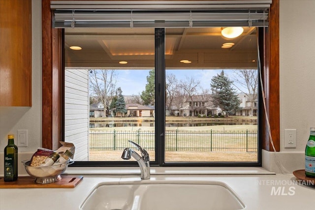 room details with light countertops and a sink