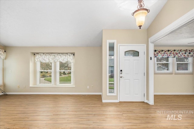 foyer with light wood-type flooring