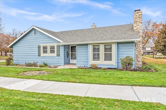 single story home with a front yard