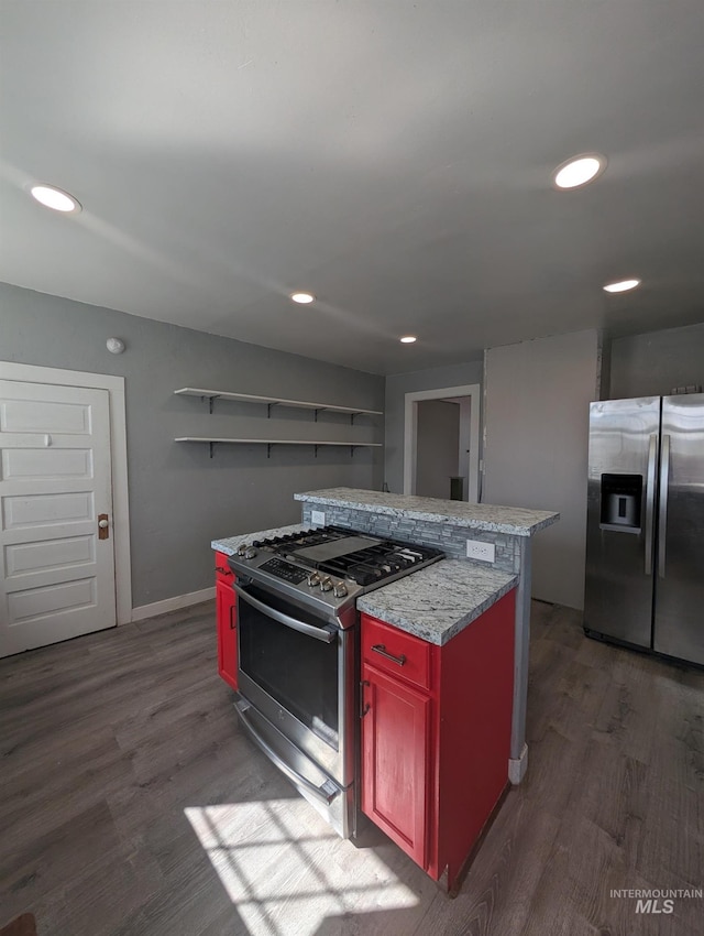 kitchen featuring appliances with stainless steel finishes, open shelves, wood finished floors, light countertops, and recessed lighting