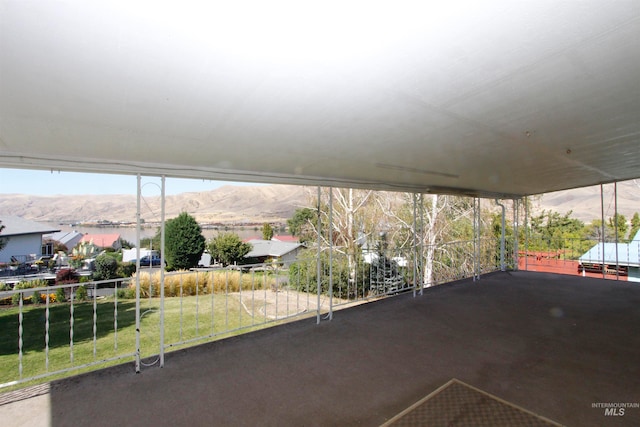 view of patio / terrace featuring a mountain view