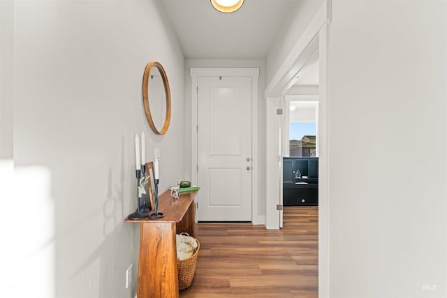 corridor with light wood-type flooring