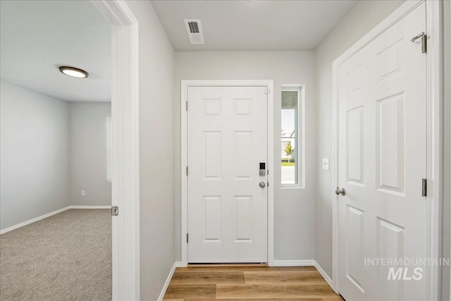 709 W Smoky Quartz St, Kuna, ID 83634 - entrance foyer featuring baseboards and light wood finished floors