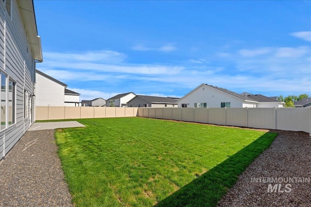 709 W Smoky Quartz St, Kuna, ID 83634 - view of yard featuring a residential view and a patio