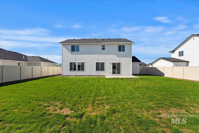 709 W Smoky Quartz St, Kuna, ID 83634 - rear view of property with a patio