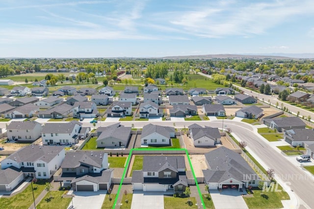 709 W Smoky Quartz St, Kuna, ID 83634 - aerial perspective of suburban area featuring property parcel outlined