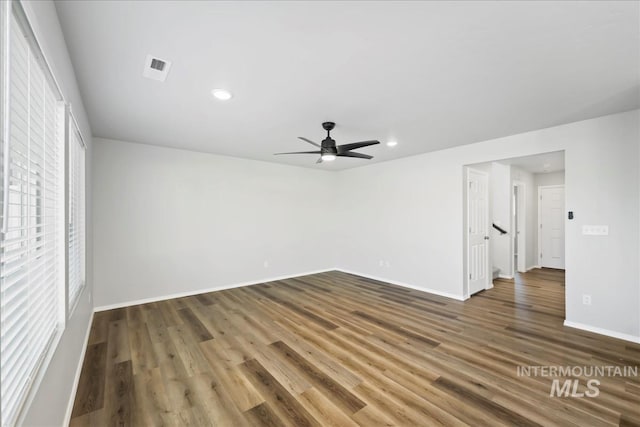 709 W Smoky Quartz St, Kuna, ID 83634 - unfurnished room featuring baseboards, a ceiling fan, wood finished floors, and recessed lighting