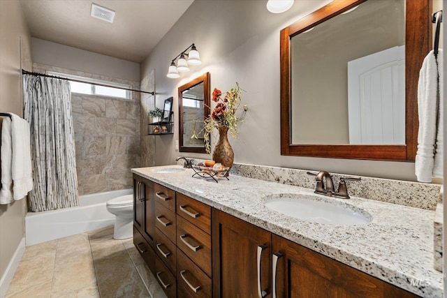 11714 W Pinewood River Ln, Star, ID 83669 - bathroom with double vanity, shower / tub combo, and tile patterned floors