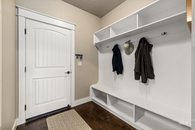 11714 W Pinewood River Ln, Star, ID 83669 - mudroom with dark wood-style flooring and baseboards