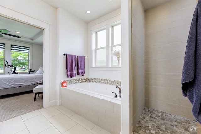 6859 N Topaz Jewel Pl, Meridian, ID 83646 - ensuite bathroom featuring a garden tub, recessed lighting, and tile patterned floors