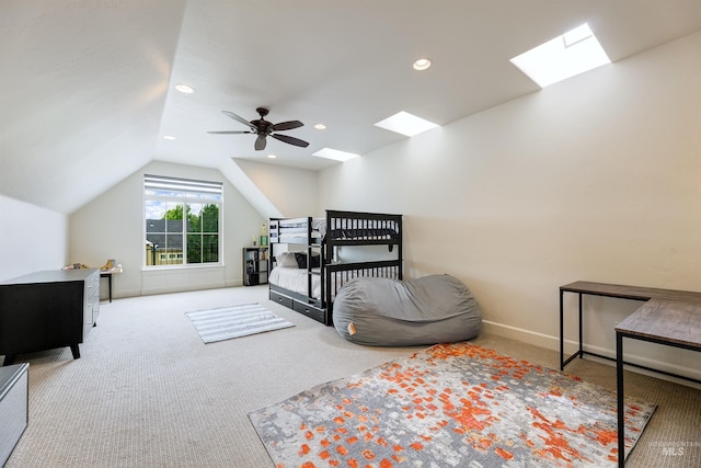6859 N Topaz Jewel Pl, Meridian, ID 83646 - carpeted bedroom with a skylight, lofted ceiling, recessed lighting, a ceiling fan, and baseboards