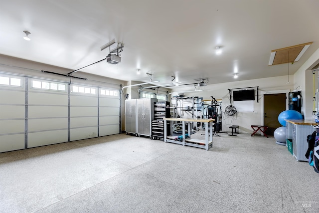 6859 N Topaz Jewel Pl, Meridian, ID 83646 - garage featuring a garage door opener