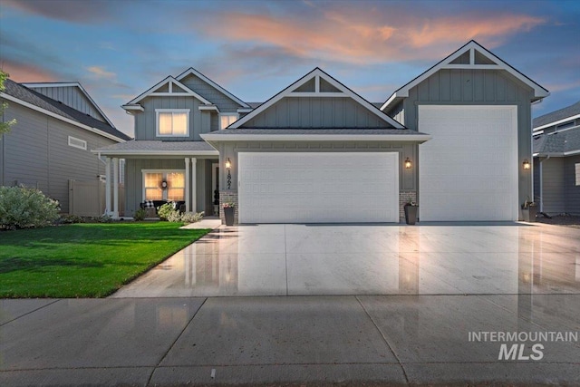 1867 W Wind Drift St, Meridian, ID 83646 - craftsman-style house featuring an attached garage, a lawn, board and batten siding, and driveway