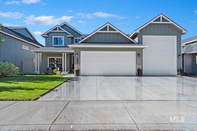 1867 W Wind Drift St, Meridian, ID 83646 - craftsman-style house with a garage, a front lawn, concrete driveway, and board and batten siding