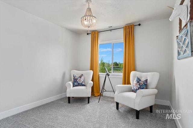 1867 W Wind Drift St, Meridian, ID 83646 - living area featuring carpet flooring, a chandelier, and baseboards