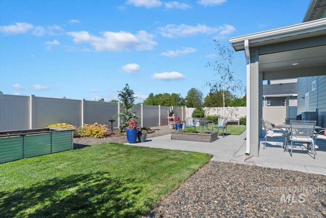 1867 W Wind Drift St, Meridian, ID 83646 - view of yard with a garden and a patio area
