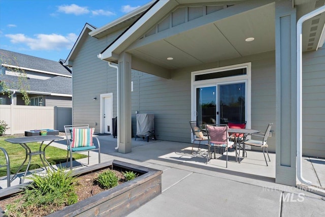 1867 W Wind Drift St, Meridian, ID 83646 - view of patio / terrace featuring fence and outdoor dining space