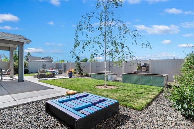1867 W Wind Drift St, Meridian, ID 83646 - view of yard with a patio area and a vegetable garden