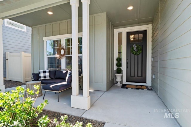 1867 W Wind Drift St, Meridian, ID 83646 - property entrance featuring board and batten siding, a porch, and an outdoor living space