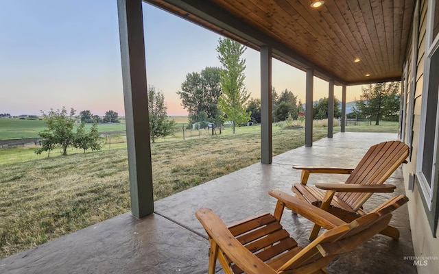 view of patio / terrace with a rural view