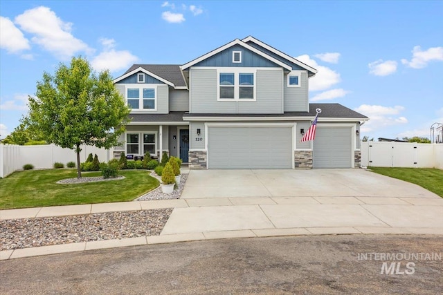 120 Pilgrim Way, Middleton, ID 83644 - craftsman-style home featuring driveway, stone siding, board and batten siding, and an attached garage