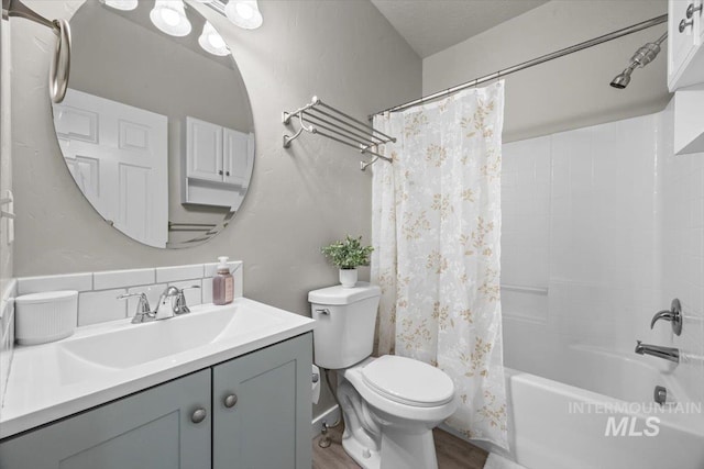 120 Pilgrim Way, Middleton, ID 83644 - bathroom featuring vanity, toilet, shower / bathtub combination with curtain, and wood finished floors