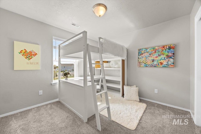 120 Pilgrim Way, Middleton, ID 83644 - bedroom with carpet flooring, baseboards, and a textured ceiling