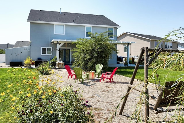 120 Pilgrim Way, Middleton, ID 83644 - back of house featuring a fire pit, a patio area, and a pergola