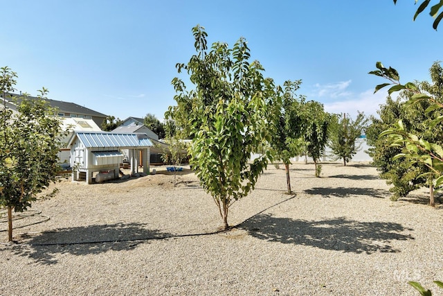 120 Pilgrim Way, Middleton, ID 83644 - view of yard with exterior structure and an outbuilding