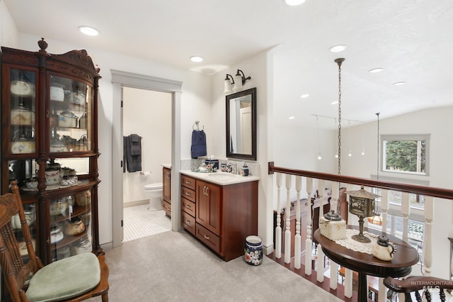 110 S 3rd Ave, Pierce, ID 83546 - full bathroom with toilet, recessed lighting, a sink, and baseboards