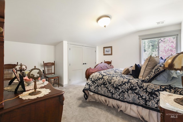 110 S 3rd Ave, Pierce, ID 83546 - bedroom featuring vaulted ceiling, light carpet, and a closet
