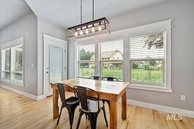 12231 W Caribee Inlet Dr, Star, ID 83669 - dining area with light wood-style flooring