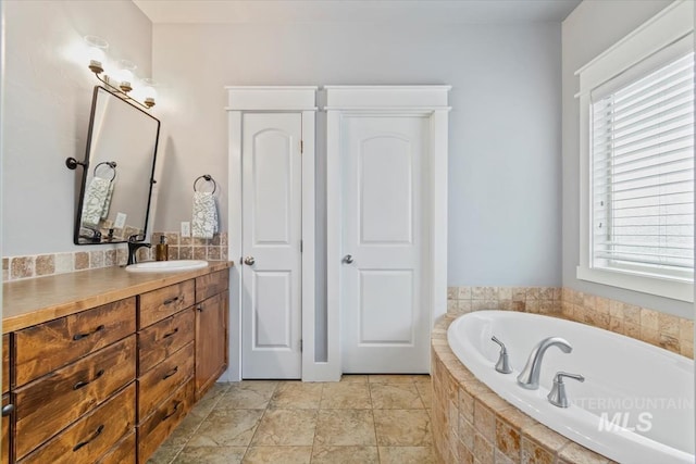 12231 W Caribee Inlet Dr, Star, ID 83669 - full bath with a garden tub and vanity