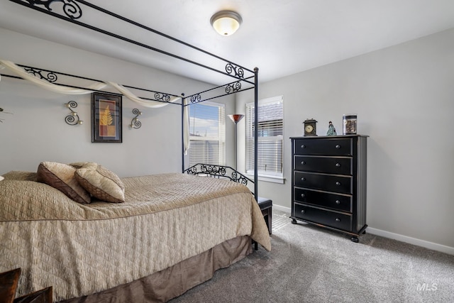 carpeted bedroom with baseboards