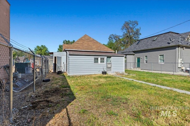 816 Denver St, Caldwell, ID 83605 - rear view of property with an outbuilding