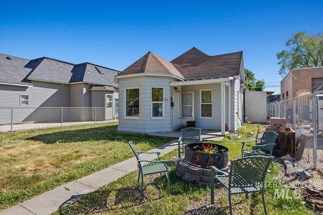 816 Denver St, Caldwell, ID 83605 - rear view of house featuring a fire pit