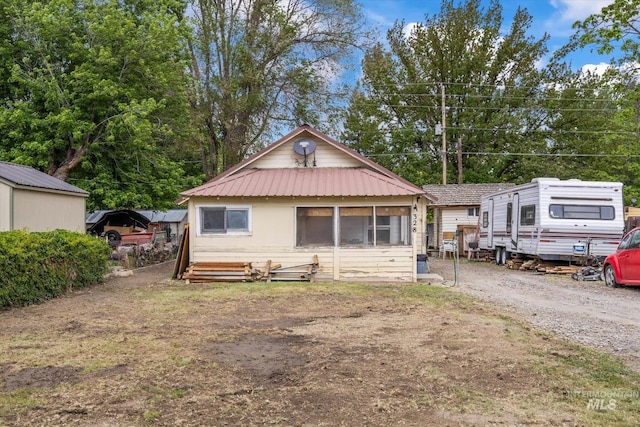 328 W Owyhee Ave, Homedale, ID 83628 - view of front of house with metal roof