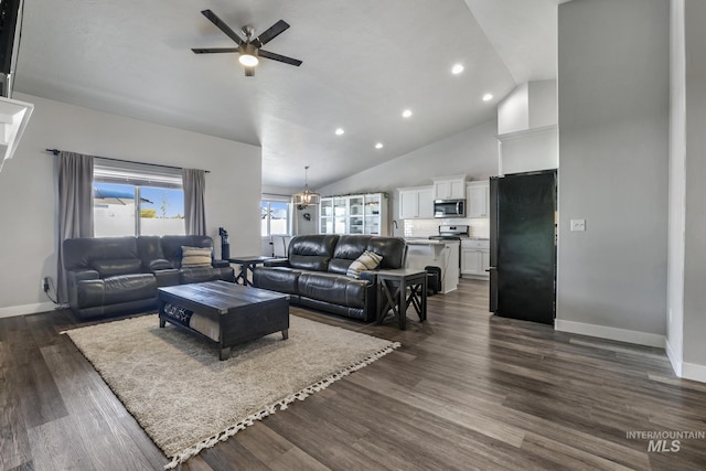 living room featuring recessed lighting, dark wood-style flooring, high vaulted ceiling, a ceiling fan, and baseboards