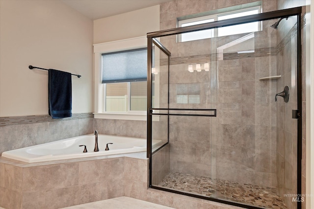 11771 W Cross Slope Way, Nampa, ID 83686 - bathroom with a shower stall and a garden tub