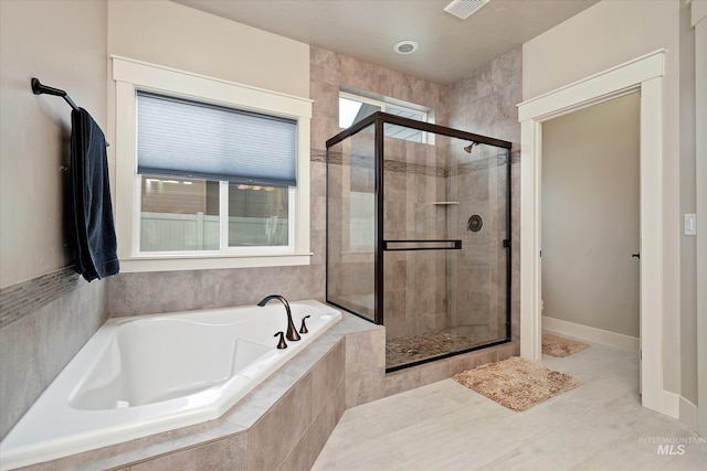 11771 W Cross Slope Way, Nampa, ID 83686 - bathroom with a garden tub, visible vents, and a shower stall